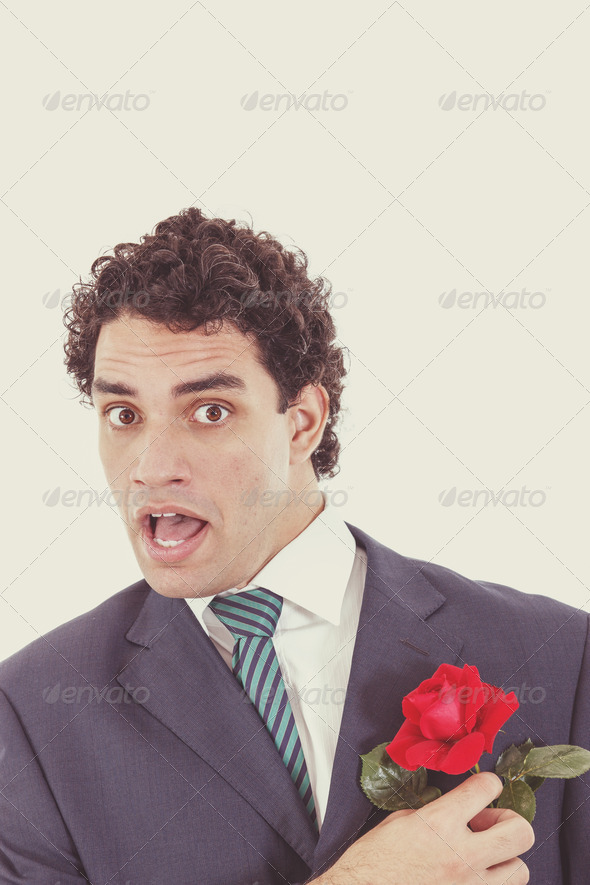 surprised shocked man in suit trying to avoid and escape rose (Misc) Photo Download