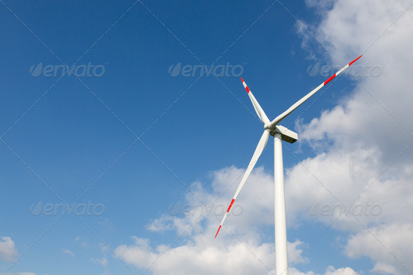 Wind turbine for clean energy production with blue sky