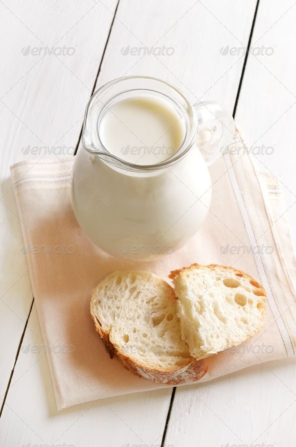 Fresh milk in jug and bread (Misc) Photo Download