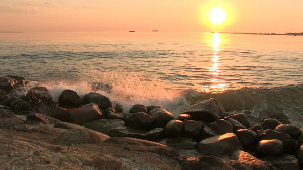 Waves On The Rocks During Sunset Waves On The Rocks During Sunset