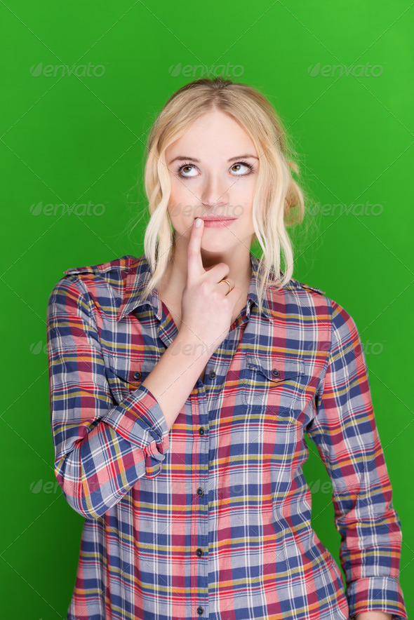 Thoughtful beautiful young blond woman - Stock Photo - Images