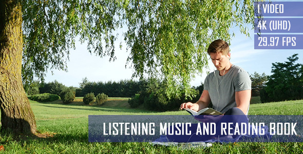 Listening Music And Reading Book In The Park Listening Music And Reading Book In The Park