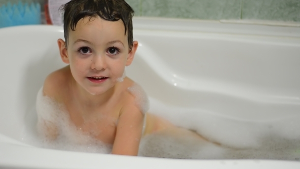 Little Boy Washes Himself in Bath 01 Little Boy Washes Himself in Bath 01