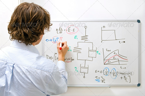 Engineer at whiteboard