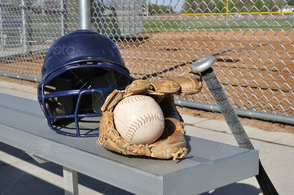 White Softball, Helmet, Bat, and Glove