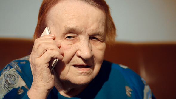 Elderly Woman Talking On The Cell Phone Elderly Woman Talking On The Cell Phone
