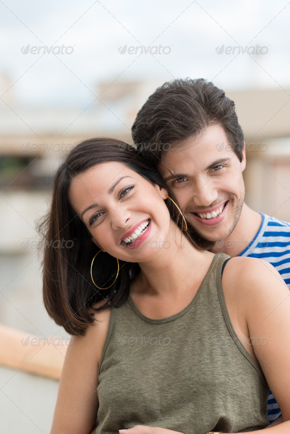 Smiling happy woman with her husband - Stock Photo - Images