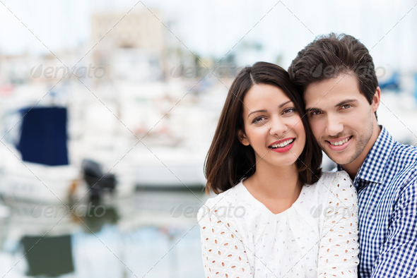 Happy affectionate couple on summer vacation - Stock Photo - Images