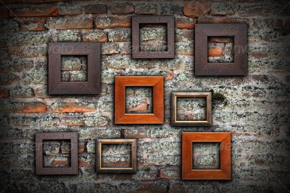 grungy old wall full of wooden frames