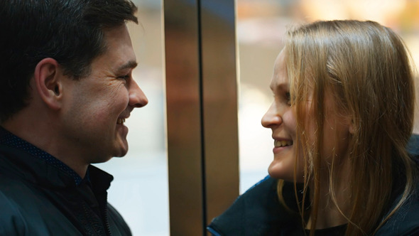 Man And Woman Talking Vividly In Lift Man And Woman Talking Vividly In Lift
