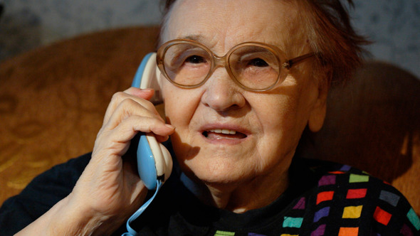 Elderly Woman In Glasses Taking A Call Elderly Woman In Glasses Taking A Call