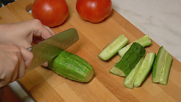 Green Cucumbers Cut into Slices for Cooking 811 Green Cucumbers Cut into Slices for Cooking 811