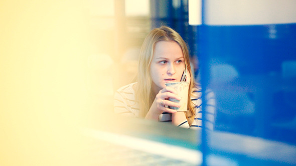 Woman In The Cafe Having A Phone Talk Woman In The Cafe Having A Phone Talk