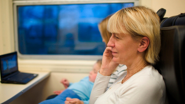 Woman In The Train Having A Phone Talk Woman In The Train Having A Phone Talk