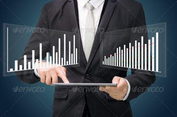 Businessman standing posture hand hold graph on tablet isolated