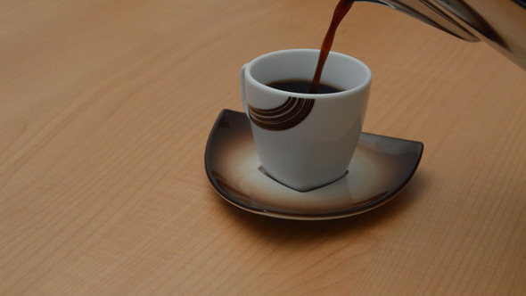Coffee Poured into Small Cup Coffee Poured into Small Cup