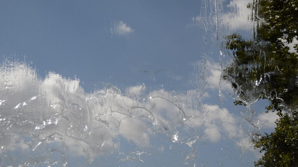 Clouds Seen Through a Waterfall Clouds Seen Through a Waterfall