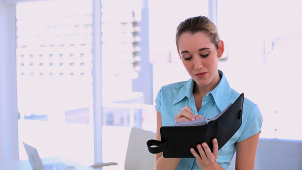 Stylish Content Businesswoman Writing In Diary Stylish Content Businesswoman Writing In Diary