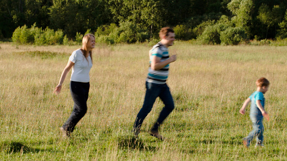 Family Of Three Spending Time Together Outdoor Family Of Three Spending Time Together Outdoor