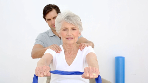 Physiotherapist Checking Senior Patients Shoulder 2 Physiotherapist Checking Senior Patients Shoulder 2