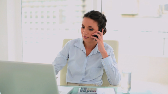 Angry Businesswoman Hanging Up The Phone Angry Businesswoman Hanging Up The Phone