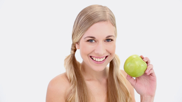 Happy Nude Blonde Holding Green Apple Happy Nude Blonde Holding Green Apple