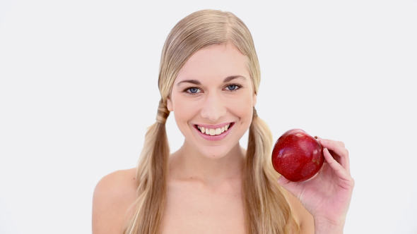 Happy Nude Blonde Holding Red Apple Happy Nude Blonde Holding Red Apple