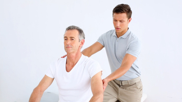 Physiotherapist Checking Senior Patient Stretching 1 Physiotherapist Checking Senior Patient Stretching 1
