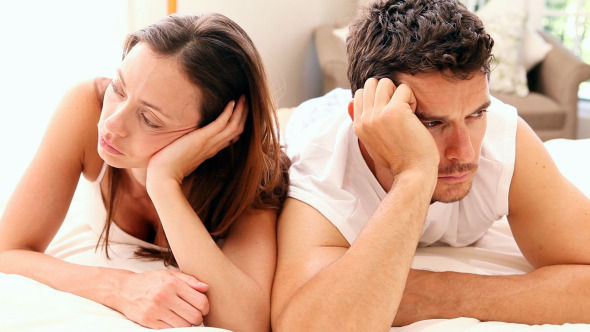 Unhappy Couple Lying On Bed Not Talking Unhappy Couple Lying On Bed Not Talking