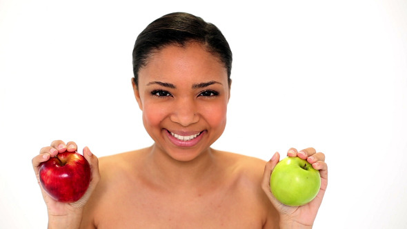 Beautiful Young Woman Holding Two Apples Beautiful Young Woman Holding Two Apples
