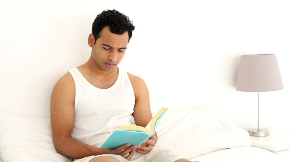 Happy Handsome Man Reading A Book Happy Handsome Man Reading A Book