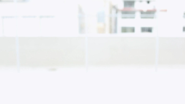 Anxious Man Peering Over Desk Anxious Man Peering Over Desk