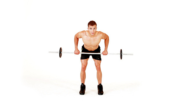 Handsome Muscular Man Doing Exercises Handsome Muscular Man Doing Exercises