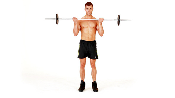 Handsome Muscular Man Doing Exercises Handsome Muscular Man Doing Exercises