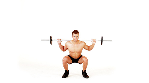 Handsome Muscular Man Doing Exercises Handsome Muscular Man Doing Exercises