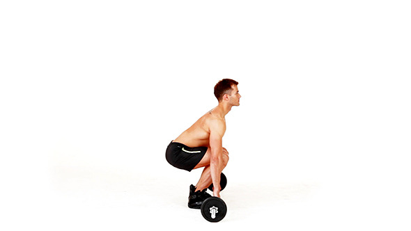 Handsome Muscular Man Doing Exercises Handsome Muscular Man Doing Exercises