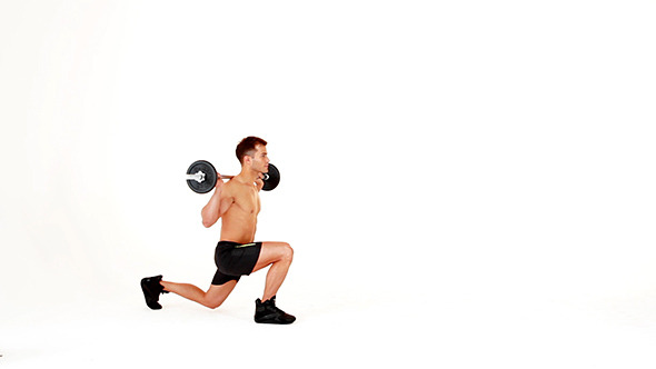 Handsome Muscular Man Doing Exercises Handsome Muscular Man Doing Exercises