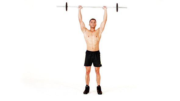 Handsome Muscular Man Doing Exercises Handsome Muscular Man Doing Exercises