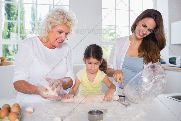 Multigeneration family women baking together in the kitchen (Misc) Photo Download