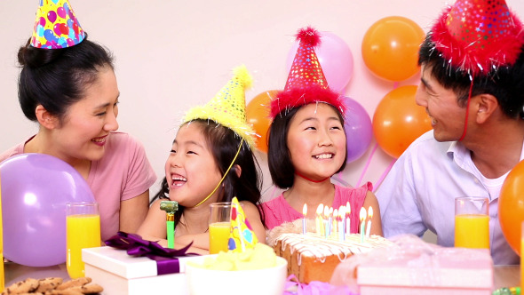 Happy Family Celebrating A Birthday 1 Happy Family Celebrating A Birthday 1