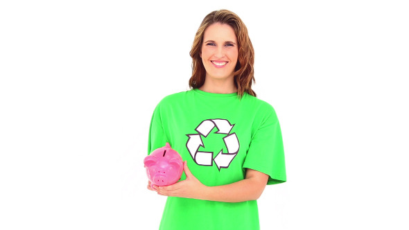 Smiling Environmental Activist Showing Piggy Bank Smiling Environmental Activist Showing Piggy Bank
