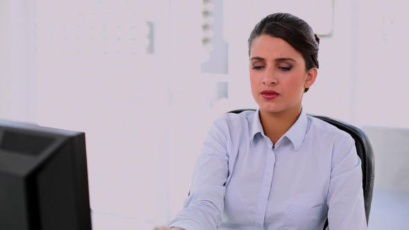 Annoyed Beautiful Businesswoman Using Her Phone Annoyed Beautiful Businesswoman Using Her Phone