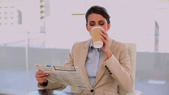 Relaxed Beautiful Businesswoman Drinking Coffee Relaxed Beautiful Businesswoman Drinking Coffee