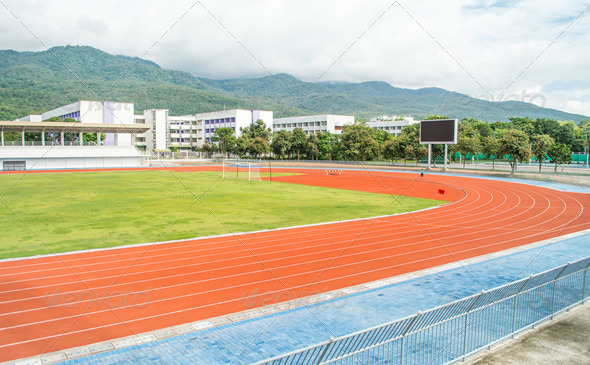 Runners racetrack surrounded by mountain (Misc) Photo Download