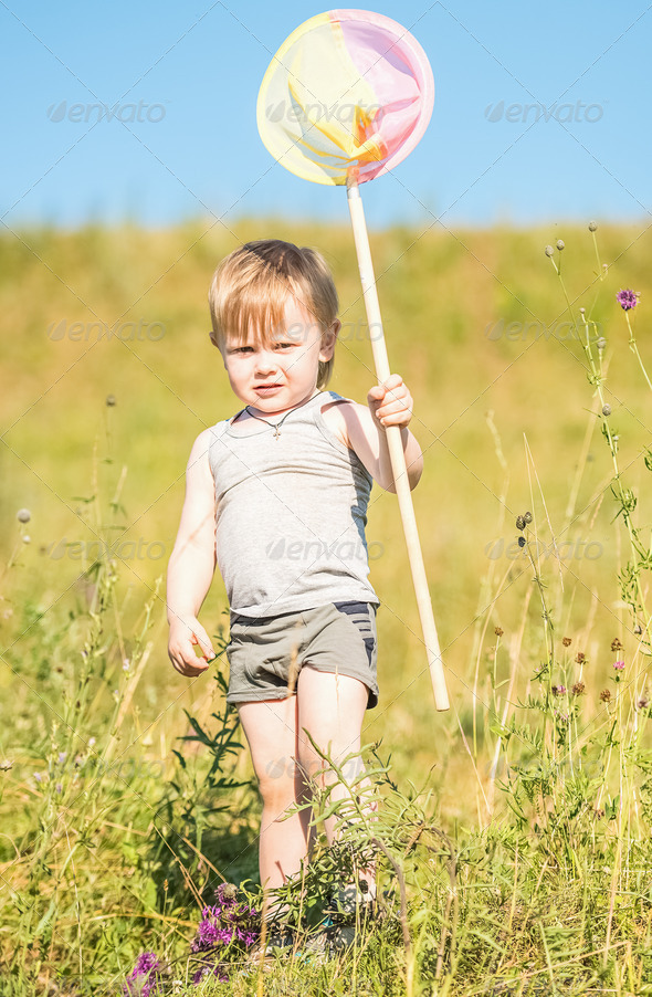 Boy catches a butterfly (Misc) Photo Download