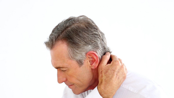 Stressed Businessman Rubbing His Neck Stressed Businessman Rubbing His Neck