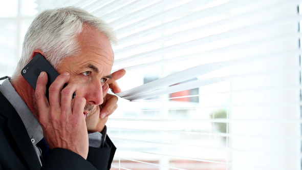 Businessman Spying Through Blinds 2 Businessman Spying Through Blinds 2