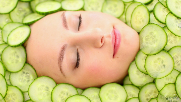 Natural Womans Face Surrounded By Cucumber 2 Natural Womans Face Surrounded By Cucumber 2