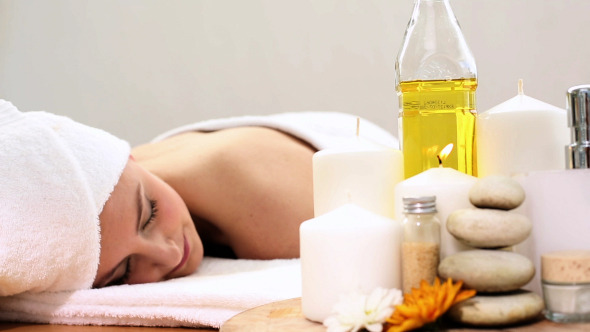 Peaceful Woman Relaxing On The Massage Table 2 Peaceful Woman Relaxing On The Massage Table 2