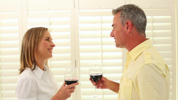 Romantic Mature Couple Drinking Red Wine Romantic Mature Couple Drinking Red Wine